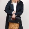 Women with Siena woven leather backpack
