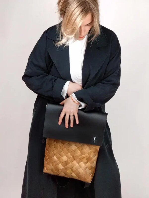 Women with Siena woven leather backpack